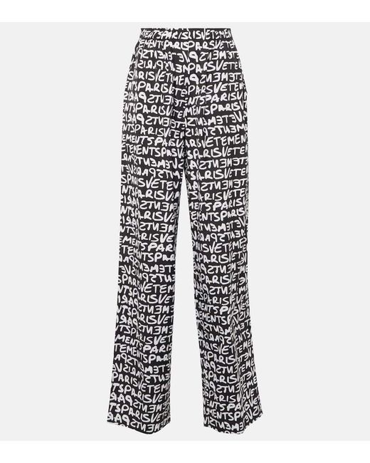 Pantalones anchos de algodon estampados Vetements de color White