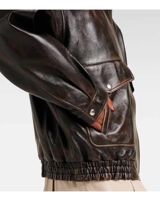 Veste En Cuir Et Shearling A Logo Miu Miu en coloris Black