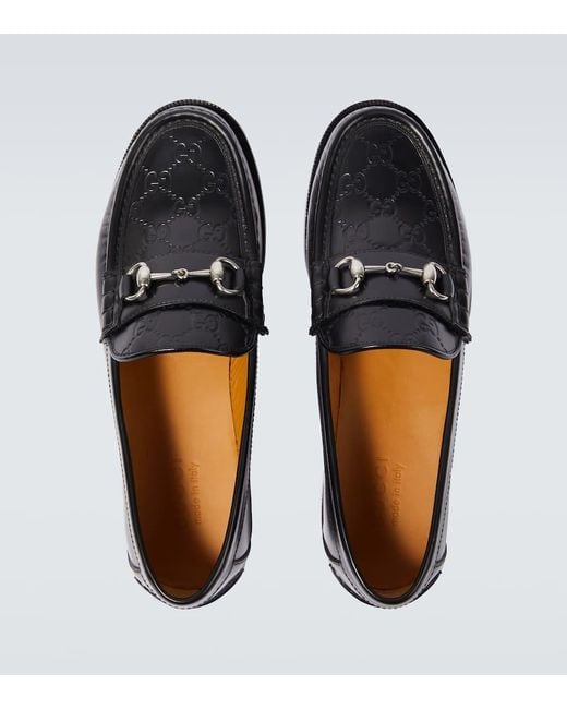 Gucci Loafers GG aus Leder in Black für Herren
