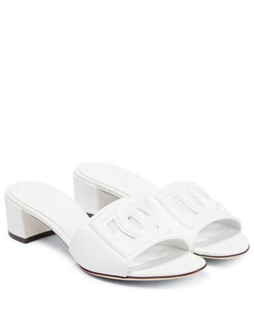 initials insignia cutout leather slides