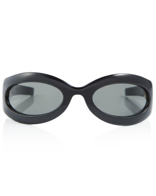 Occhiali da sole ovali di Gucci in Nero | Lyst