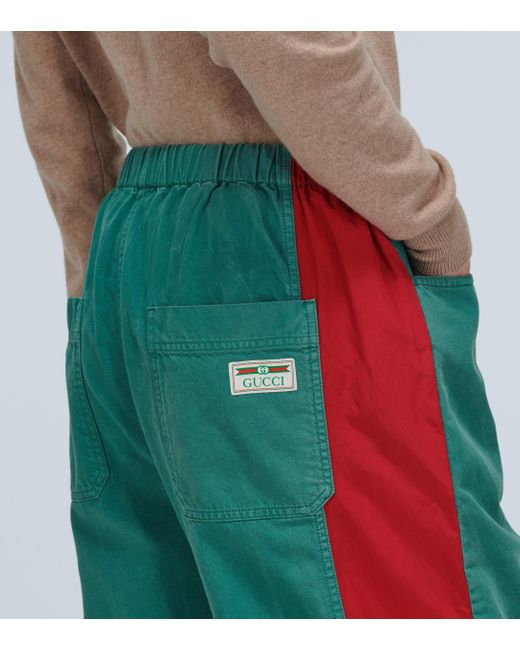 green red track pants