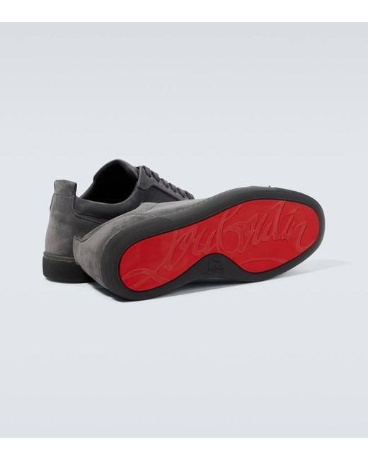 Sneakers Louis Junior Spikes in suede di Christian Louboutin in Black da Uomo