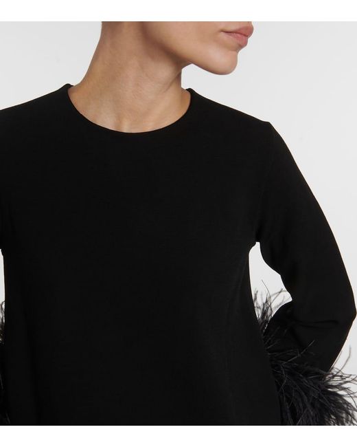 Blusa con ribete de plumas Valentino de color Black