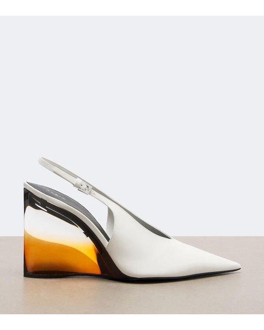 Alaïa White Invisible Leather Wedge Pumps