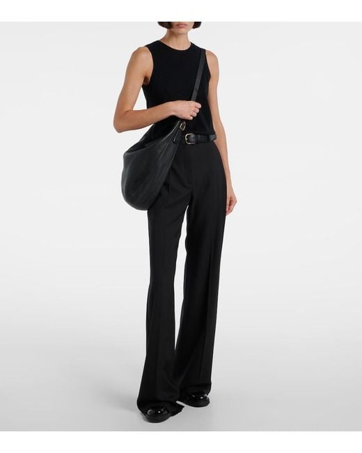 Tod's Black Leather Penny Loafers