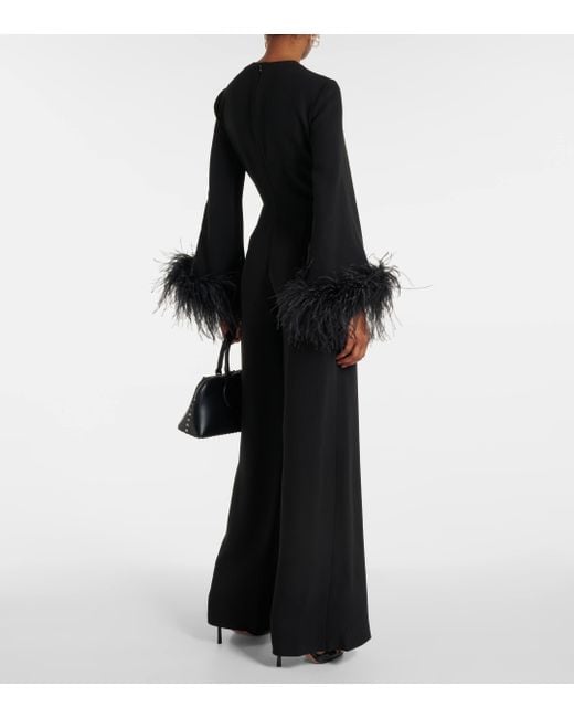 Combi-pantalon en soie a plumes Valentino en coloris Black