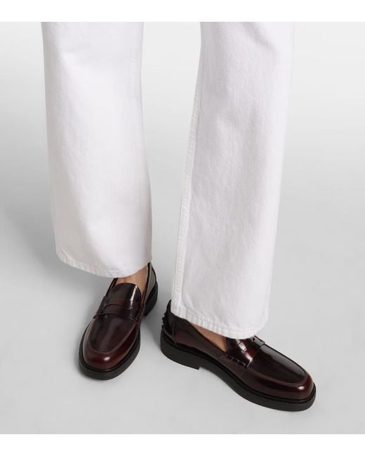 Tod's Black Leather Penny Loafers