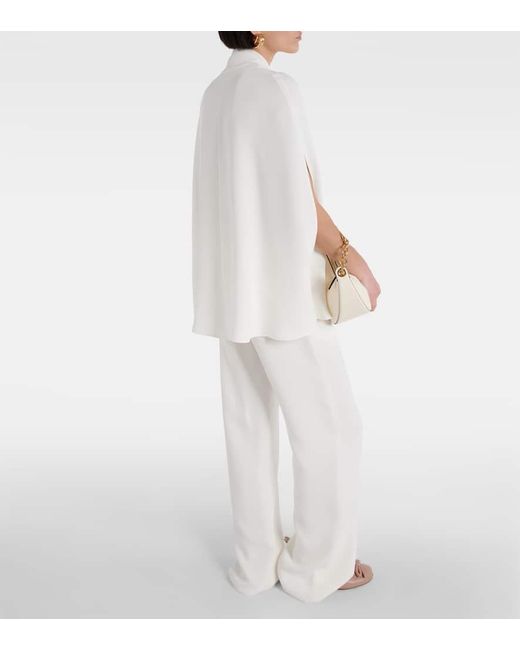 Blusa de seda con lazada y capa Valentino de color White