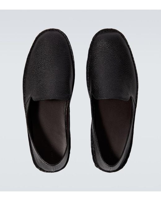 The Row Black Vasko Leather Slip-On Shoes for men
