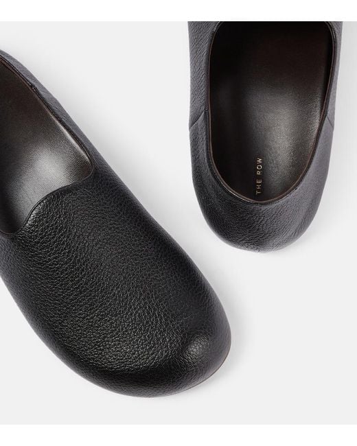 The Row Black Hugh Leather Slip-On Shoes