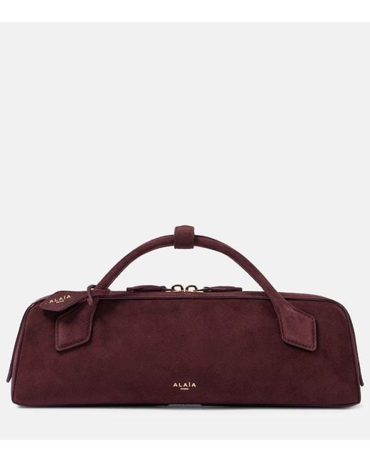 Clutch Le Teckel di Alaïa in Purple