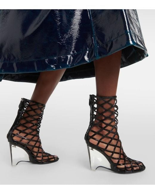 Alaïa Black Leather Wedge Ankle Boots