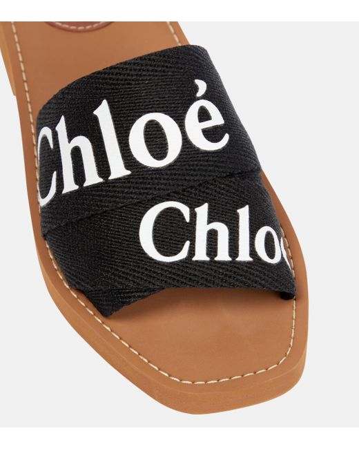 Mules Woody a logo Chloé en coloris Black