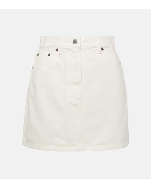 Minifalda de denim de tiro alto Prada de color White
