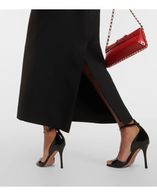 Robe longue en Crepe Couture a plumes Valentino en coloris Black
