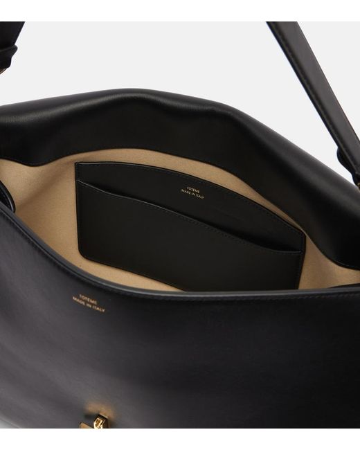 Totême Black T-Lock Medium Leather Tote Bag