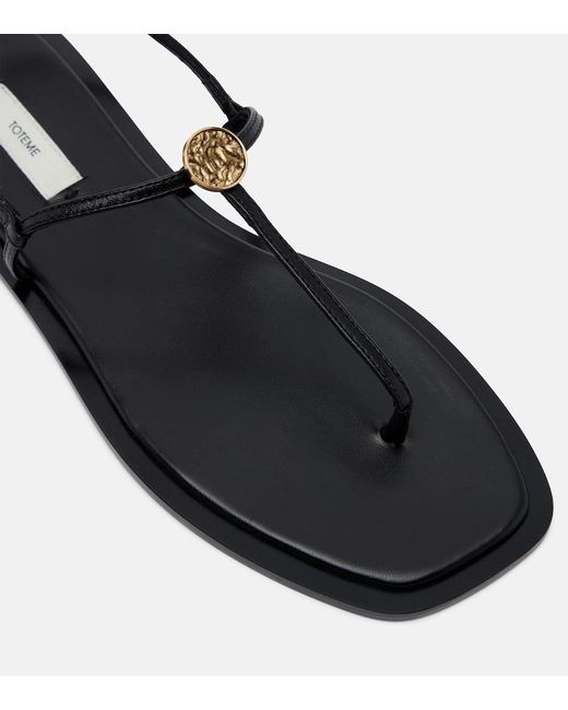 Totême Black Leather Thong Sandals
