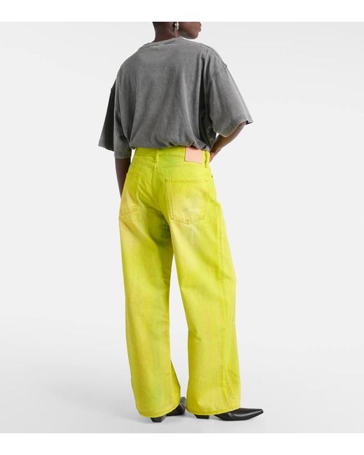 Jeans a gamba larga e vita bassa di Acne in Yellow