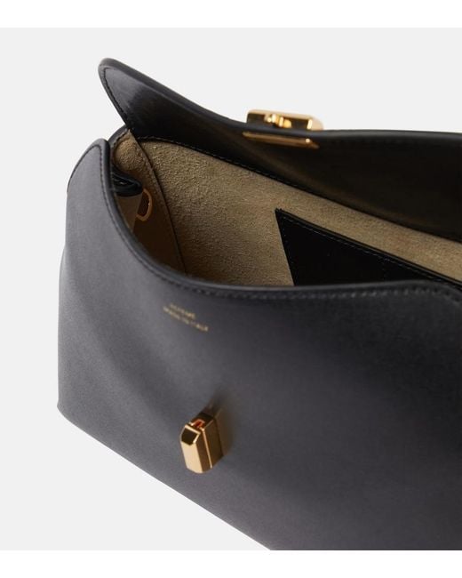 Totême Black T-Lock Small Leather Clutch