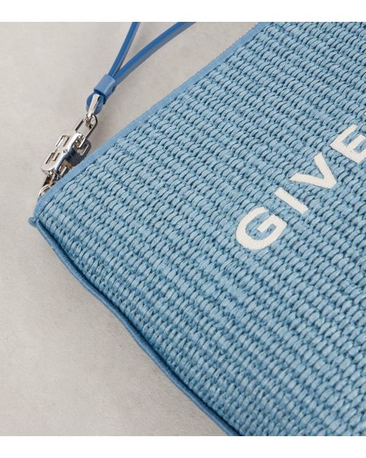 Pochette a logo Givenchy en coloris Blue