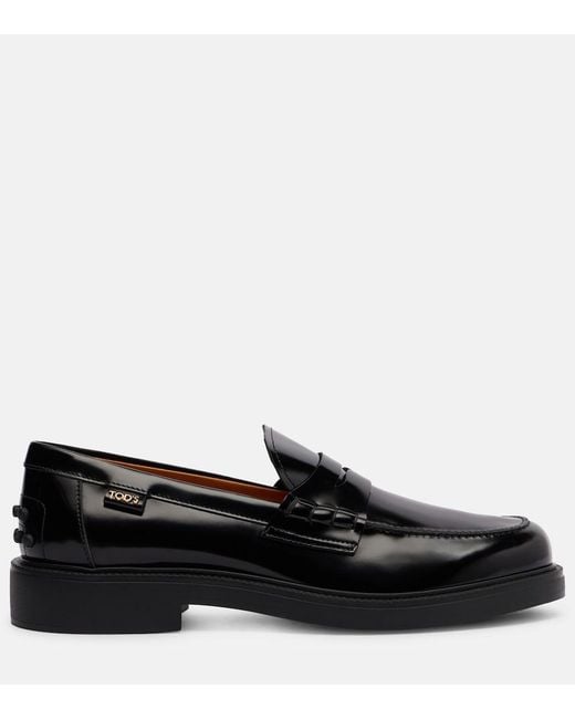 Tod's Black Leather Penny Loafers