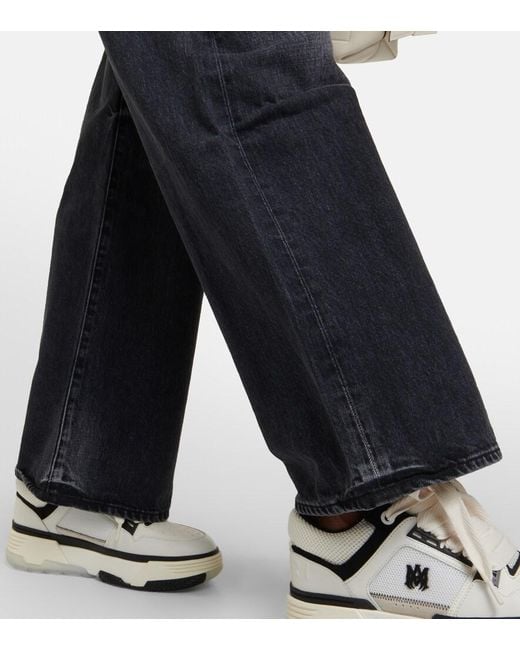 Jean Ample Amiri en coloris Blue