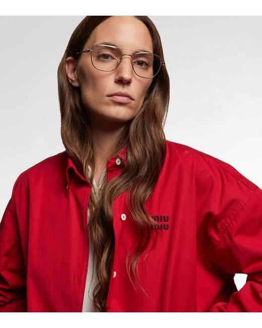 Miu Miu Metallic Aviator Glasses