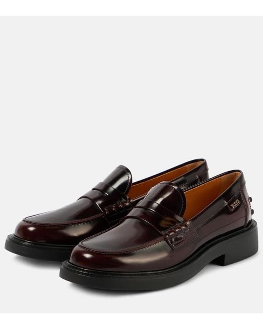 Tod's Black Leather Penny Loafers