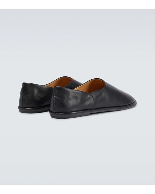 The Row Black Canal Slip-On Leather Shoes for men