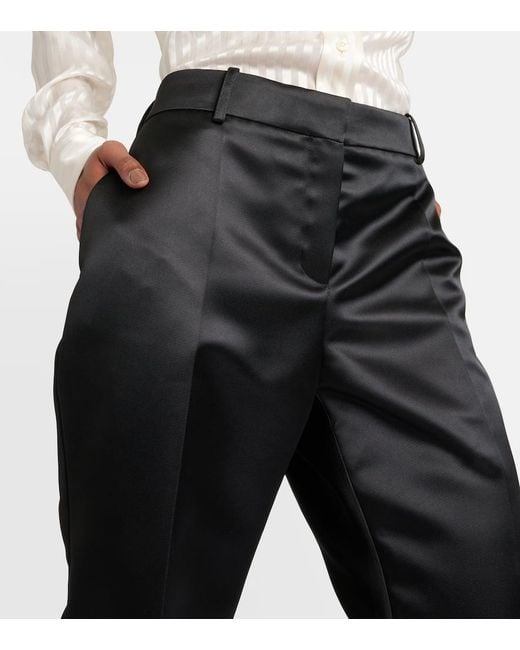 Pantalones flared de saten Nina Ricci de color Black