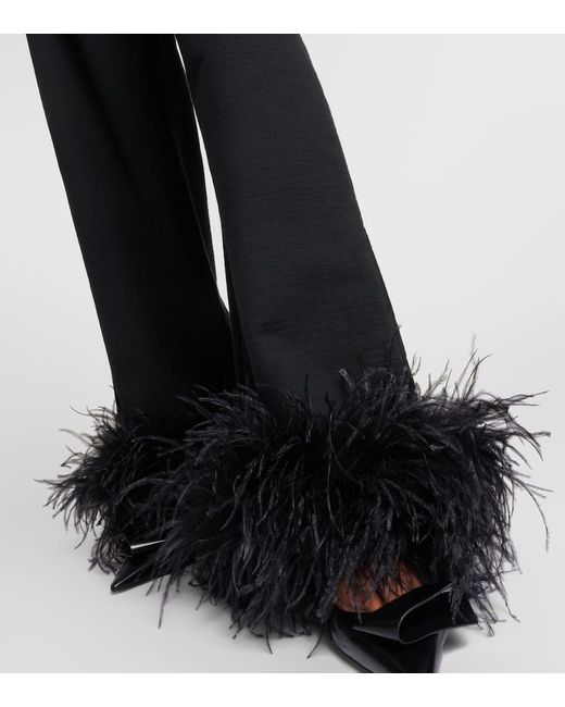 Pantalones deportivos de algodon con plumas Prada de color Black