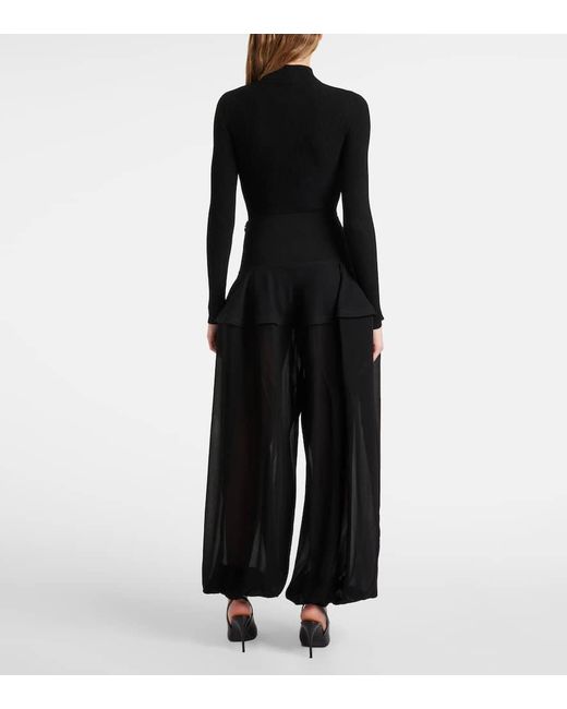 Pantaloni A Gamba Larga di Alaïa in Black