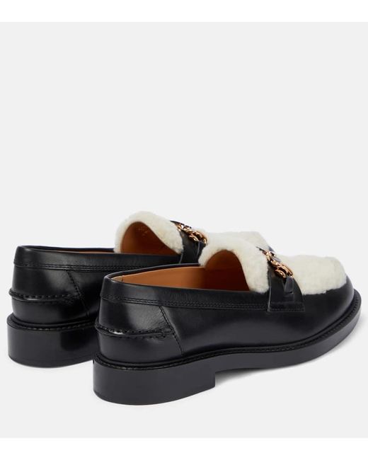 Tod's Black Leather And Shearling Loafers