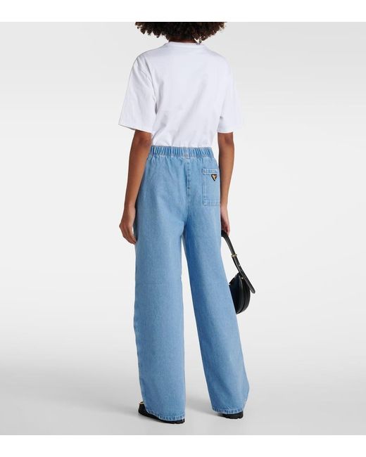 Jeans anchos con logo Prada de color Blue