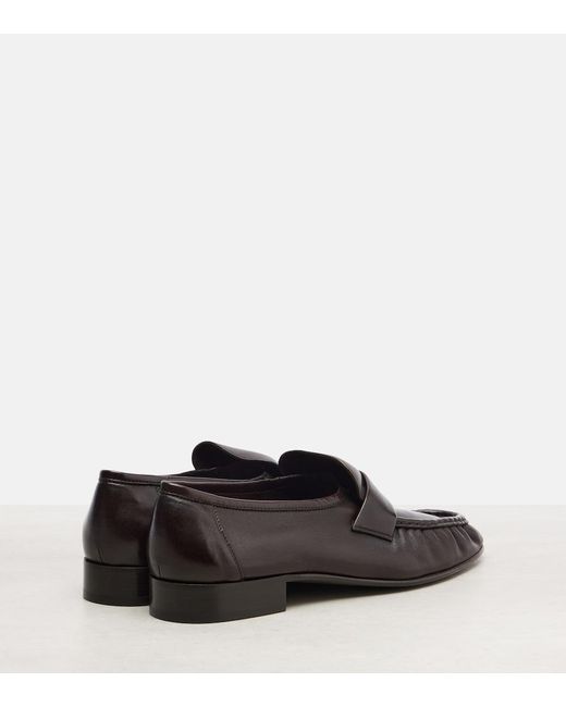 The Row Black Soft Leather Penny Loafers