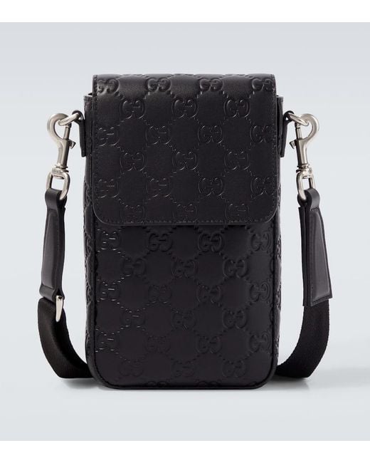 Gucci Black Gg Emblem Debossed Leather Phone Pouch for men