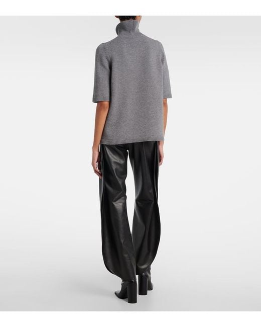 Alaïa Black High-Rise Leather Barrel-Leg Pants