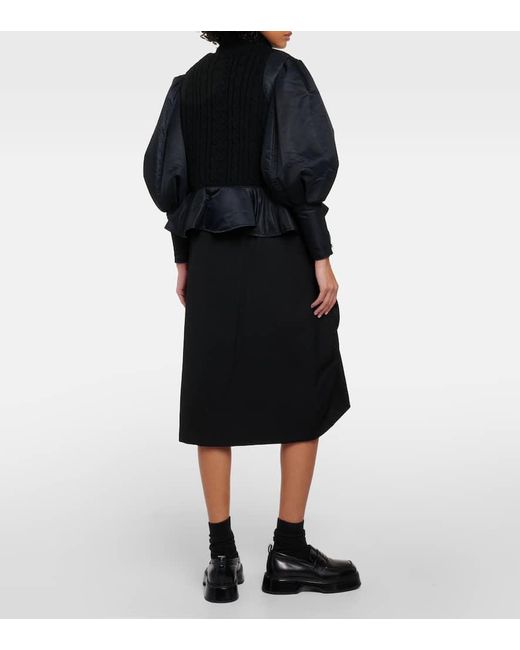 Bomber tecnica de lana con peplum Noir Kei Ninomiya de color Black