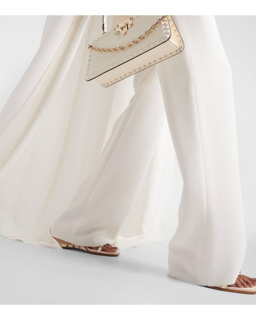 Pantalones anchos de seda de tiro alto Valentino de color White