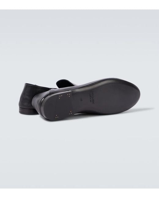 Saint Laurent Black Alain Leather Slippers for men