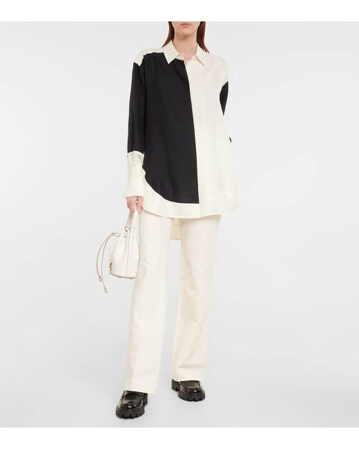 Tod's Black Schwarze Lederflache Slipper Für Damen