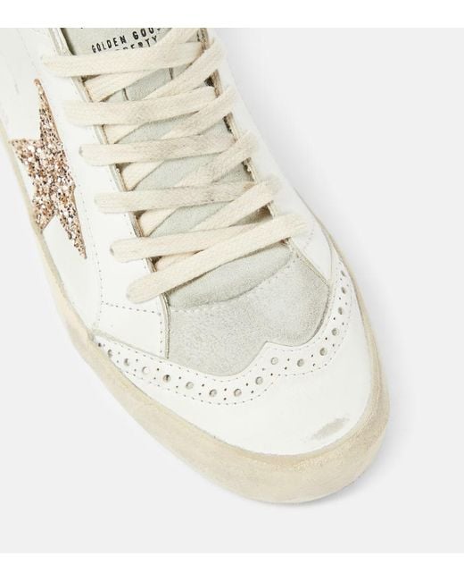 Sneakers Mid Star in pelle con glitter di Golden Goose Deluxe Brand in White