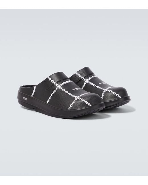 Undercover Black X Oofos Printed Mules for men