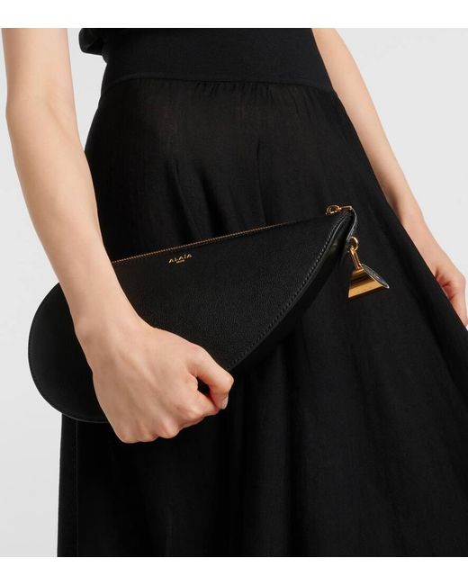 Alaïa Black Clutch Le Demi Cour Aus Leder