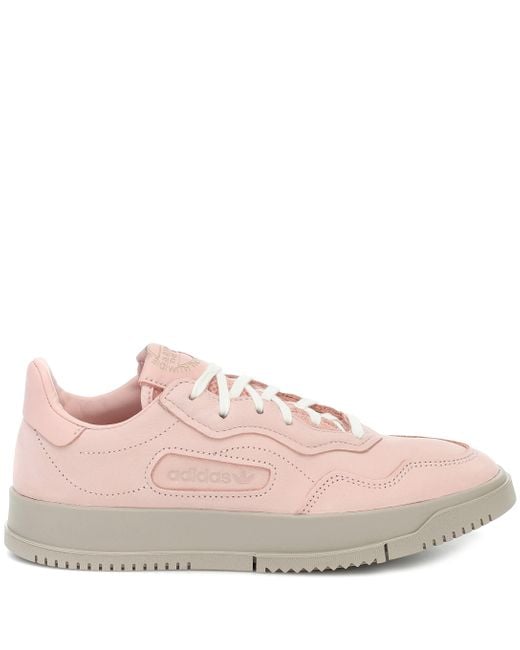 adidas originals sc premiere trainers in pink suede