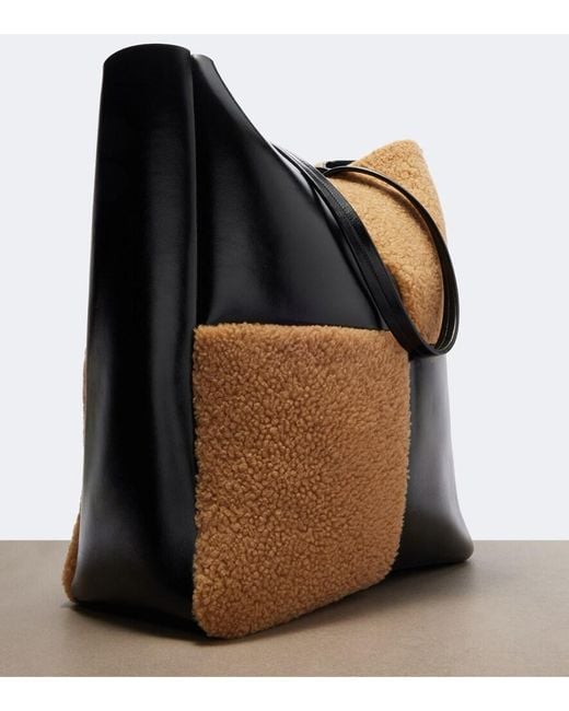 Khaite Black Zoe Medium Shearling Paneled Tote Bag