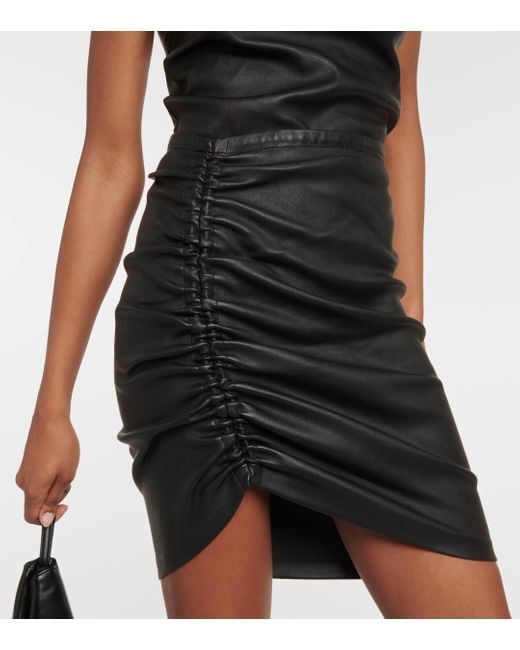 Mini-jupe Mouna en cuir Stouls en coloris Black