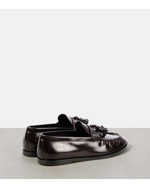 The Row Black Leather Penny Loafers
