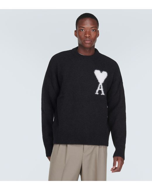 https://www.lyst.com/clothing/ami-de-cour-alpaca-wool-blend-sweater/